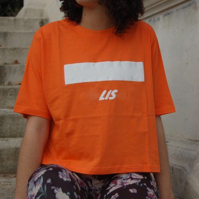women orange croped t shirt from supreme creations